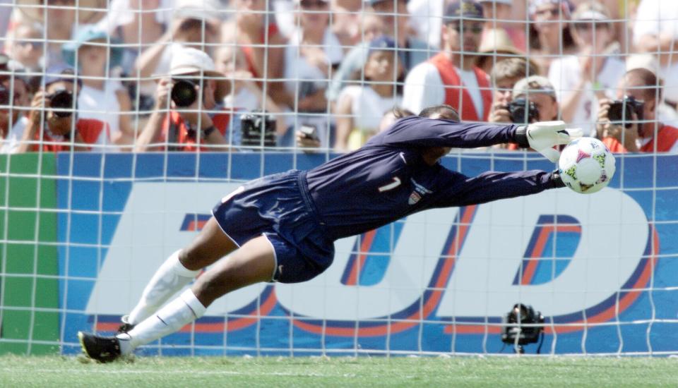 Briana Scurry knocks away a penalty shot by China's Liu Ying during the 1999 FIFA Women's World Cup final at the Rose Bowl.