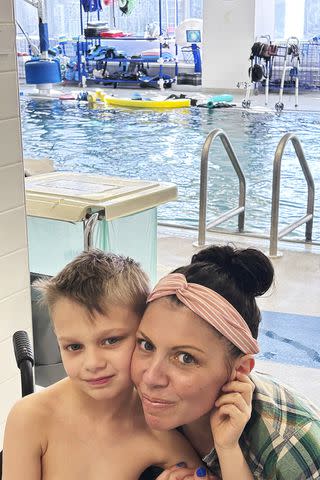 <p>Courtesy Keely Roberts</p> Keely Roberts with son Cooper at his first adaptive swim lesson