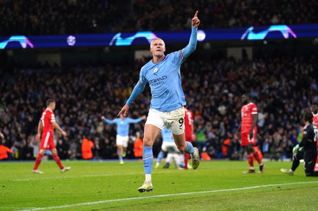 Erling Haaland celebrates scoring against Bayern Munich in the Champions League 