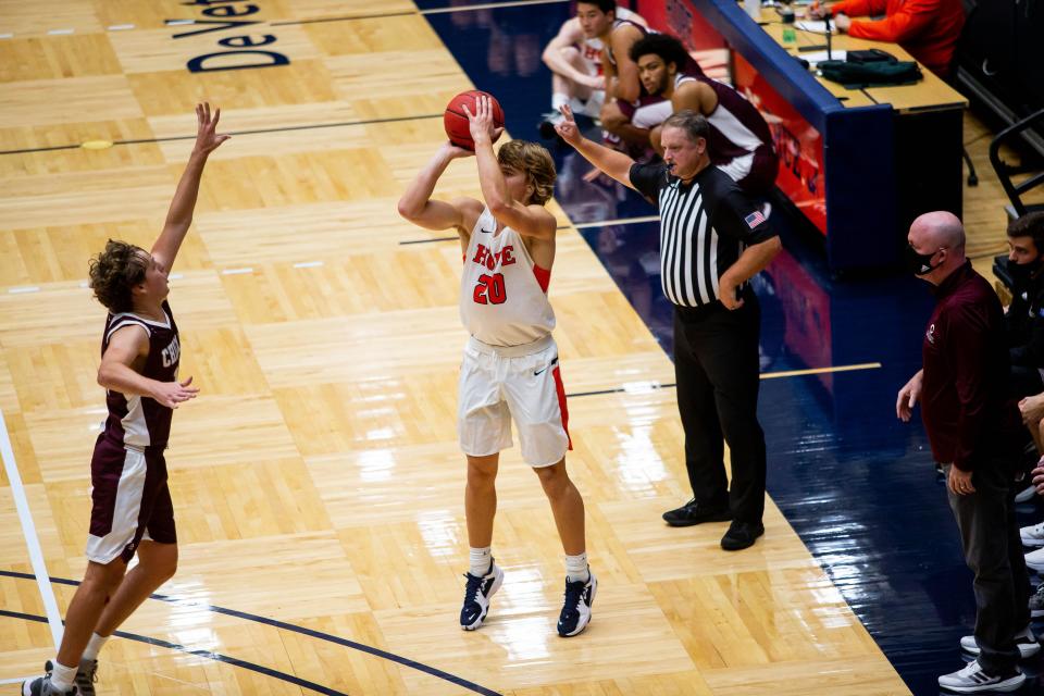 Hope's Noah Hedrick lobs a three against Chicago Friday, Oct. 29, 2021, at DeVos Fieldhouse in Holland. 