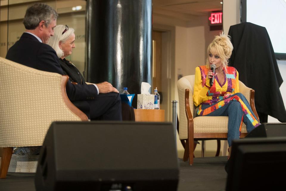 Dolly Parton speaks with with Governor John Carney and First Lady Tracey Quillen Carney during the Delaware for Imagination Library Celebration Thursday, May 5, 2022, at the Wilmington Public Library. 