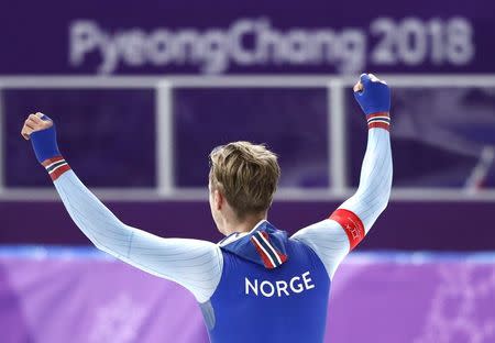 Speed Skating - Pyeongchang 2018 Winter Olympics - Men's 500m Competition Finals - Gangneung Oval - Gangneung, South Korea - February 19, 2018. Havard Lorentzen of Norway celebrates after winning a gold medal. REUTERS/Damir Sagolj