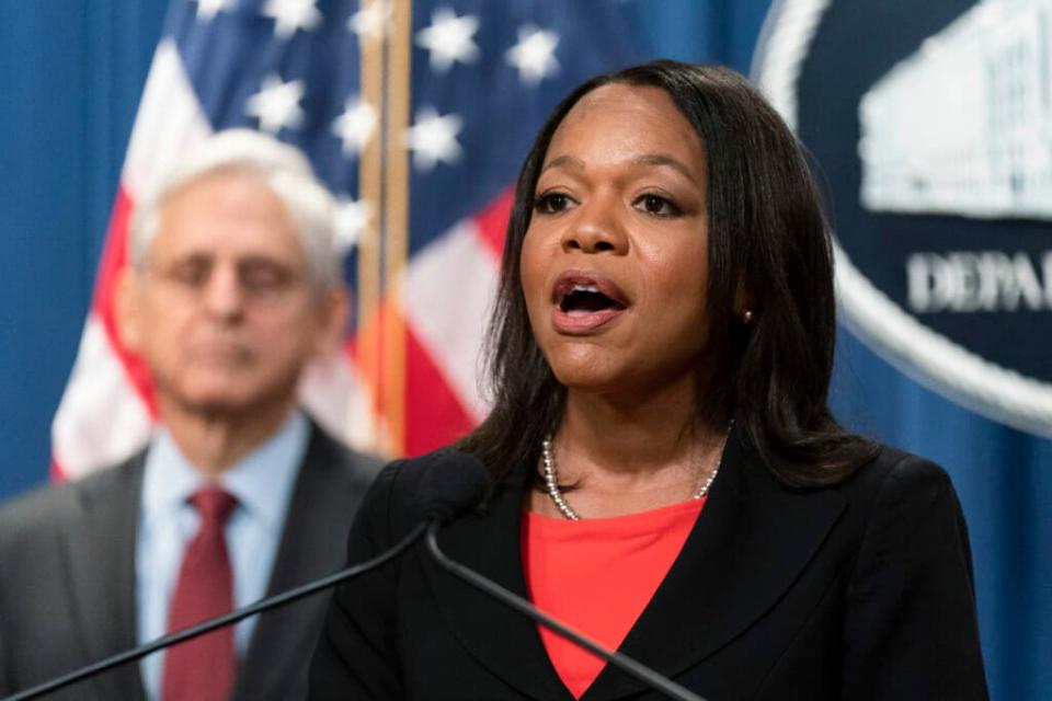 Assistant Attorney General Kristen Clarke for the Department of Justice’s Civil Rights Division, with Attorney General Merrick Garland, speaks during a news conference at the Department of Justice in Washington, Thursday, Aug. 4, 2022. (AP Photo/Manuel Balce Ceneta)