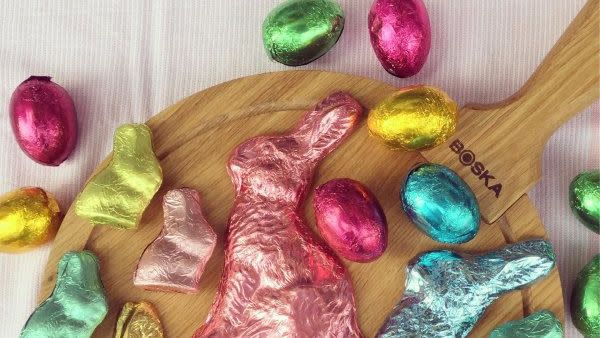 chocolate easter bunnies wrapped in blue gold and pink foil