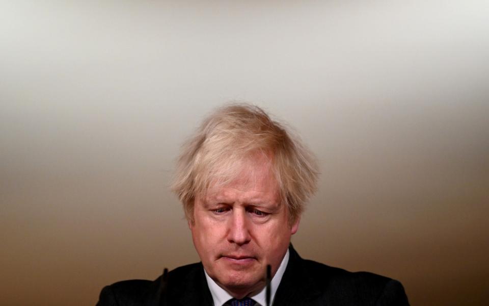 Boris Johnson and ministers are considering plans to open the economy by mid-summer  - Reuters