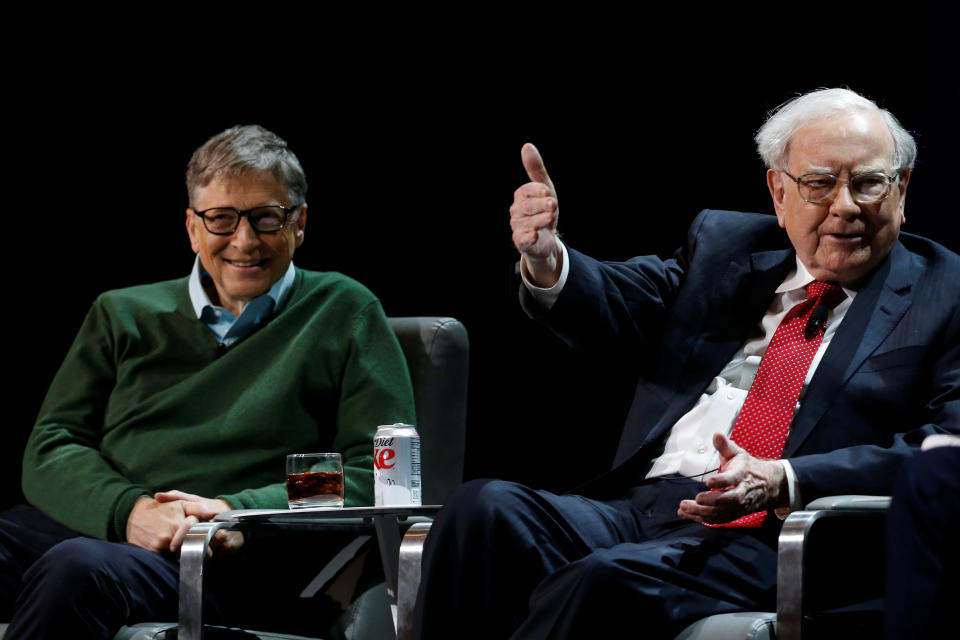 Warren Buffett, chairman and CEO of Berkshire Hathaway, speaks while Bill Gates looks on at Columbia University in New York, U.S., January 27, 2017. REUTERS/Shannon Stapleton