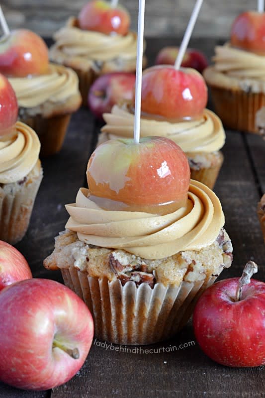 <p>Lady Behind the Curtain</p><p> The cute caramel apple topper really sends these caramel apple cupcakes over the top.</p><p><strong>Get the recipe:</strong> <a href="https://www.ladybehindthecurtain.com/caramel-apple-party-cupcakes/" rel="nofollow noopener" target="_blank" data-ylk="slk:Caramel Apple Party Cupcakes;elm:context_link;itc:0;sec:content-canvas" class="link rapid-noclick-resp"><strong>Caramel Apple Party Cupcakes</strong></a></p>
