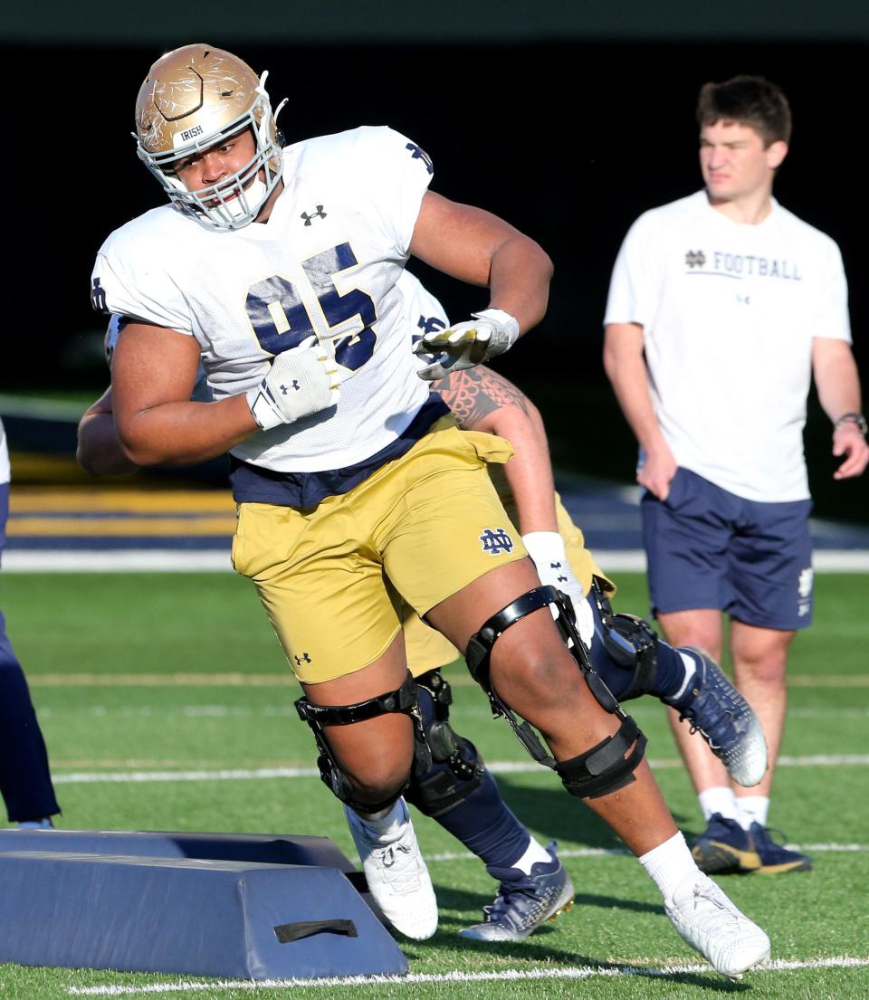 Notre Dame defensive lineman Tyson Ford (95) goes through drills Wednesday, April 12, 2023, during spring football practice on the Notre Dame campus.