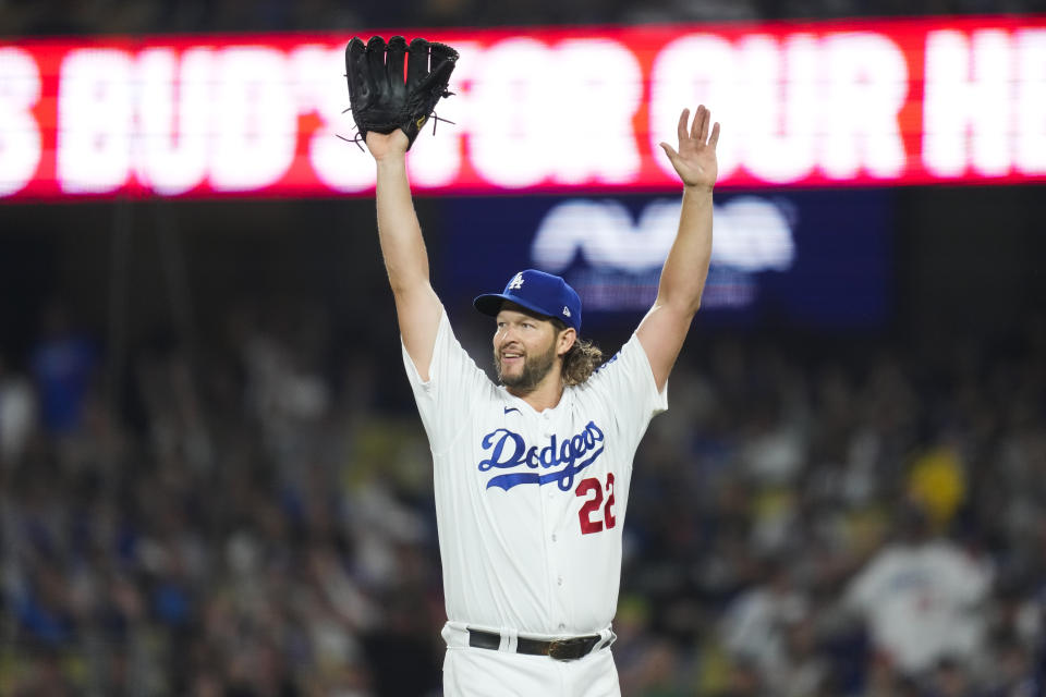 Los Angeles Dodgers starting pitcher Clayton Kershaw (22) reacts after left fielder David Peralta caught a line drive hit by San Francisco Giants' Austin Slater during the fifth inning of a baseball game in Los Angeles, Saturday, Sept. 23, 2023. (AP Photo/Ashley Landis)