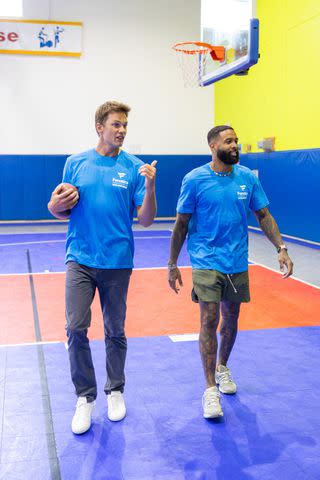 <p>Fanatics</p> Tom Brady and Odell Beckham Jr. at Fanatics' Merch Madness event