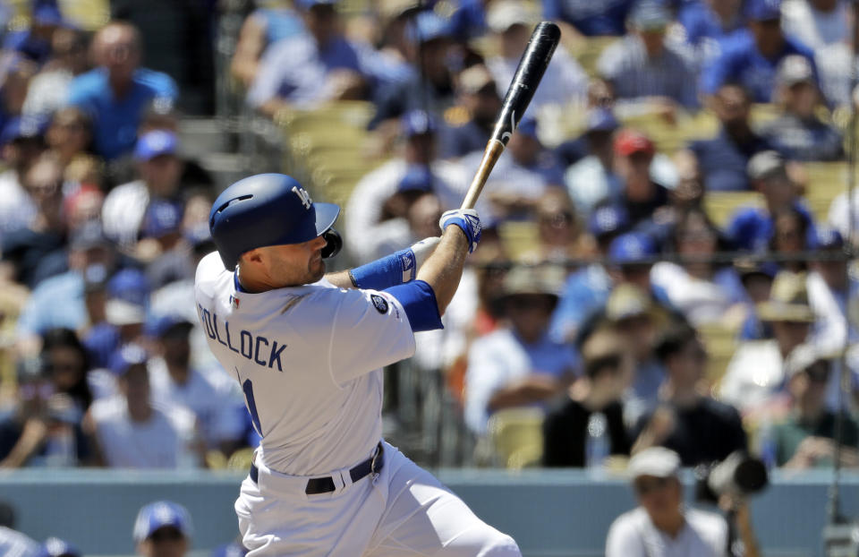 Los Angeles Dodgers' A.J. Pollock hits a three-run home run off Cincinnati Reds starting pitcher Sonny Gray during the sixth inning of a baseball game Wednesday, April 17, 2019, in Los Angeles. (AP Photo/Marcio Jose Sanchez)
