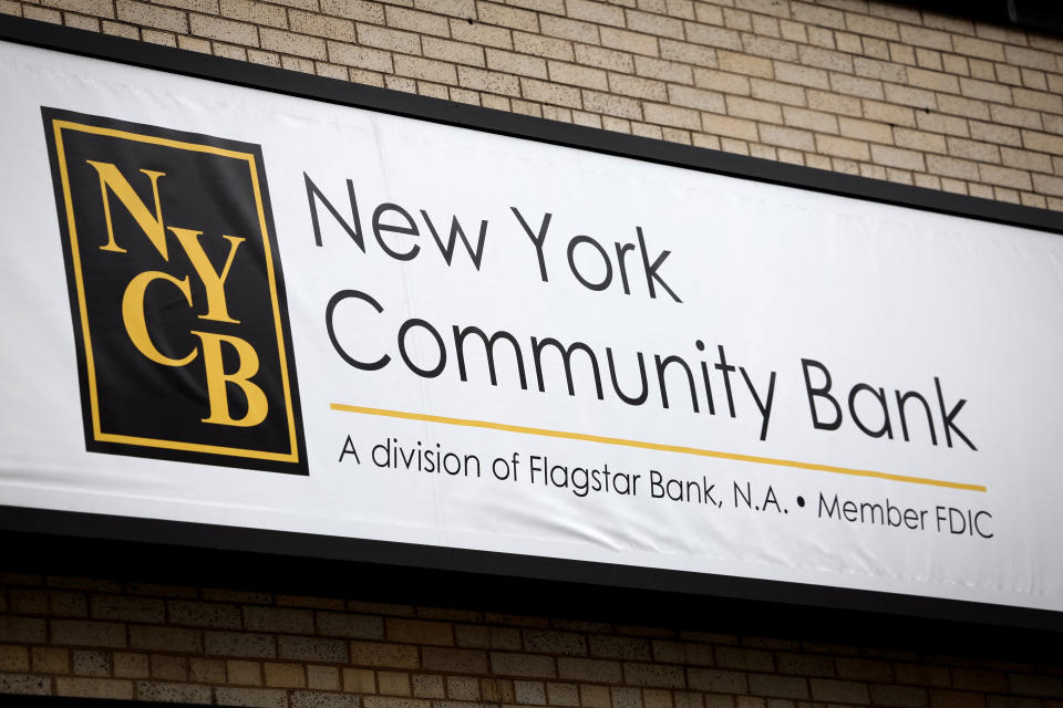 A sign is pictured above a branch of the New York Community Bank in Yonkers, New York, U.S., January 31, 2024. REUTERS/Mike Segar/File Photo