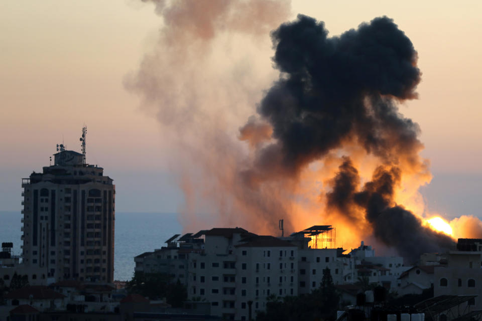 Smoke and flames rise during Israeli airstrikes as cross-border violence between the Israeli military and Palestinian militants continues in Gaza City on May 14, 2021. / Credit: Reuters/Ibraheem Abu Mustafa