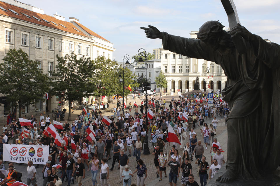 Supporters of the far-right organization National-Radical Camp, ONR, take part in the commemoration of the 1944 Warsaw Uprising, in Warsaw, Poland, Monday Aug. 1, 2022. Poles are marking the 78th anniversary of the Warsaw Uprising, a doomed revolt against Nazi German forces during World War II. (AP Photo/Michal Dyjuk)