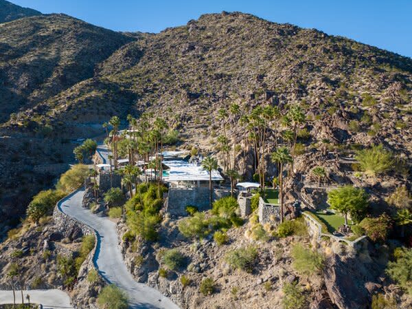 The home is one of three properties perched on a private ridge, protected by a gated road.