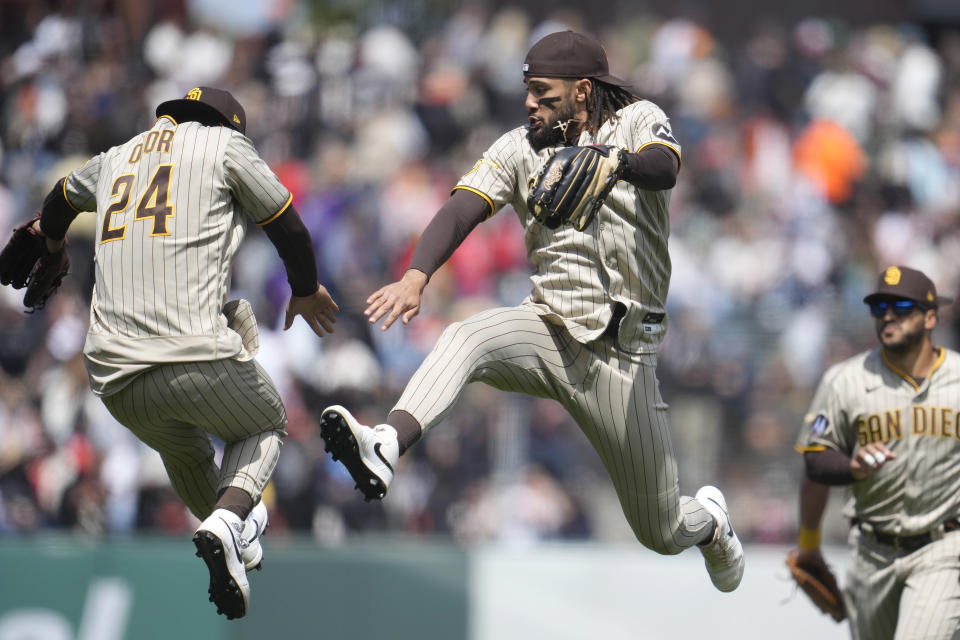 San Diego Padres' Rougned Odor (24) celebrates with Fernando Tatis Jr. after the Padres defeated the San Francisco Giants in a baseball game in San Francisco, Thursday, June 22, 2023. (AP Photo/Jeff Chiu)