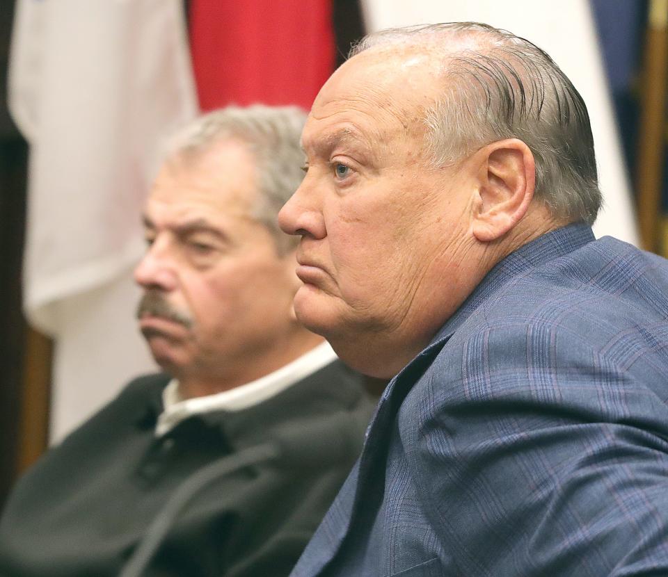 Former Public Utilities Chairman Sam Randazzo, left, and former FirstEnergy CEO Charles "Chuck" Jones in Summit County Court during an arraignment hearing with Judge Susan Baker Ross on charges related to the FirstEnergy scandal on Feb. 13 in Akron.