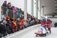 Elana Meyers Taylor, front, and Lake Kwaza, from the United States compete during the during their first run of the women's bobsled World Cup race in Winterberg, Germany, Saturday, Dec. 15, 2018. (Christophe Gateau/dpa via AP)