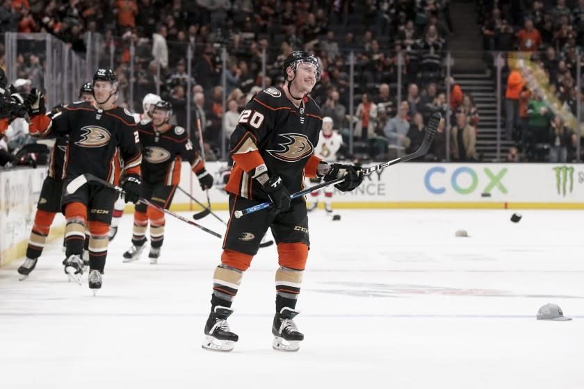 Anaheim Ducks left wing Nicolas Deslauriers celebrates after a hat trick against the Ottawa Senators during the first period of an NHL hockey game in Anaheim, Calif., Tuesday, March 10, 2020. (AP Photo/Chris Carlson)