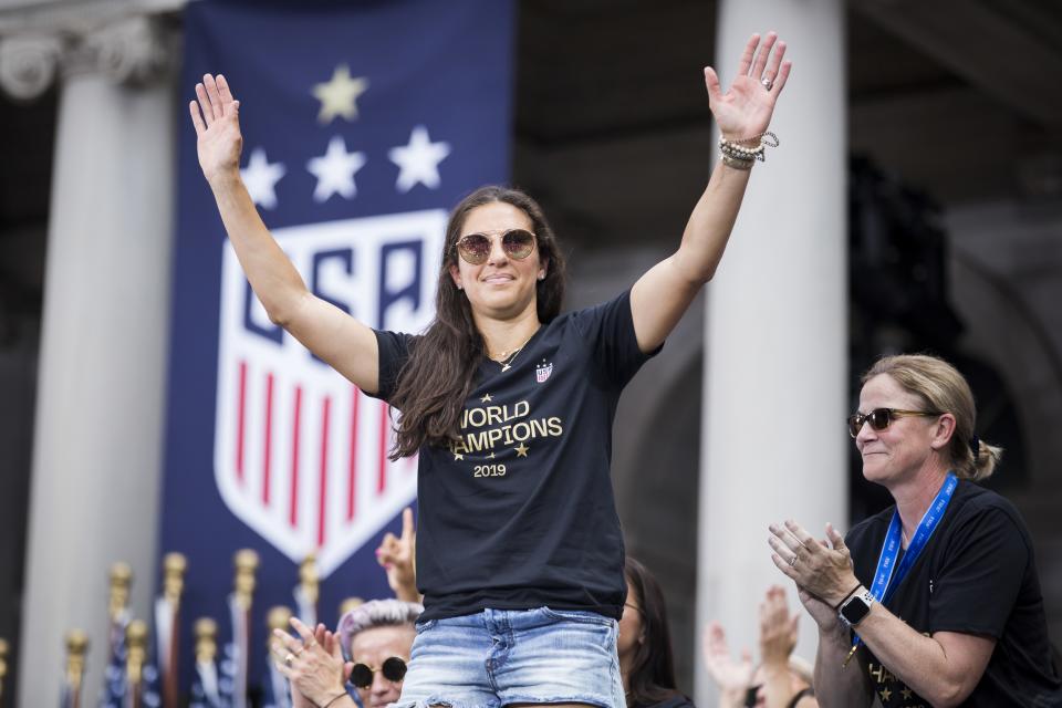 Carli Lloyd celebrates during the ceremony on the steps of City Hall after the ticker tape parade down Broadway and through the Canyon of Heroes after Team USA's 2019 FIFA World Cup Championship title.