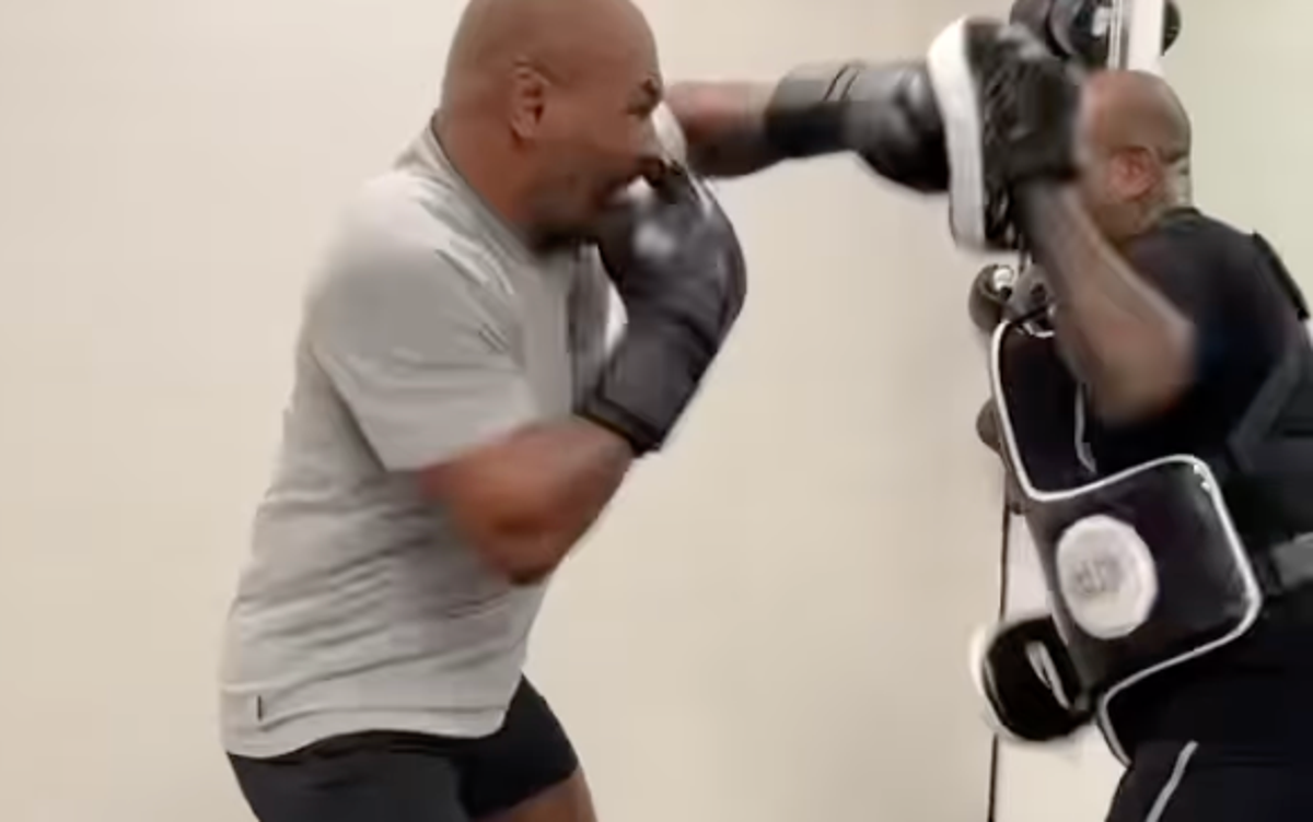 Mike Tyson pummels the pads in training for his fight with Jake Paul (@MikeTyson)