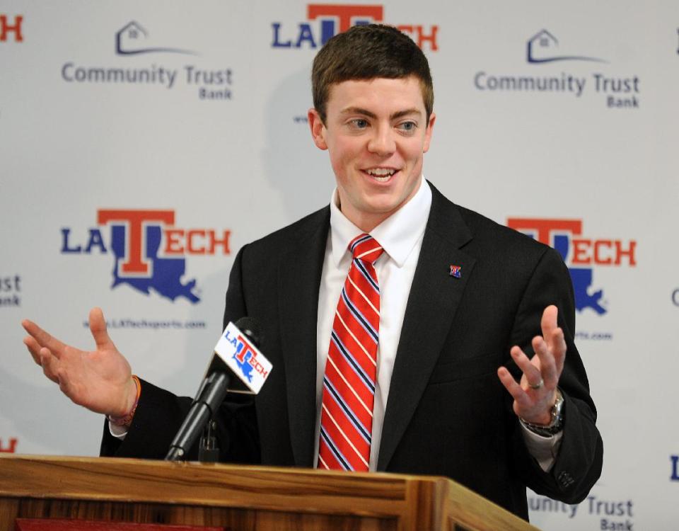 Tyler Summitt smiles during a press conference where it was formally announced that he will take over as the new Louisiana Tech women's basketball coach, Wednesday, April 2, 2014 in Ruston, La. The 23-year-old Summitt is the son of Hall-of-Fame Tennessee Lady Vols coach Pat Summitt. (AP Photo/The Shreveport Times, Douglas Collier) MAGS OUT; MANDATORY CREDIT SHREVEPORTTIMES.COM; NO SALES