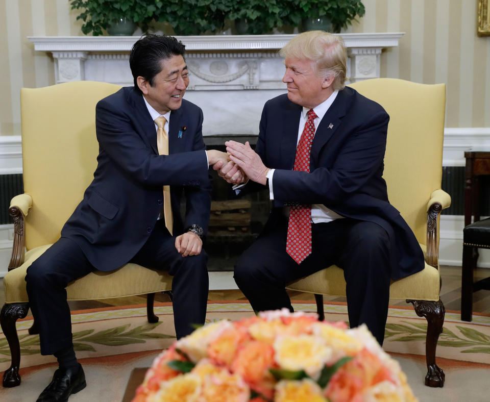 <p>President Donald Trump shakes hands with Japanese Prime Minister Shinzo Abe in the Oval Office of the White House in Washington, Friday, Feb. 10, 2017. (Photo: Evan Vucci/AP) </p>