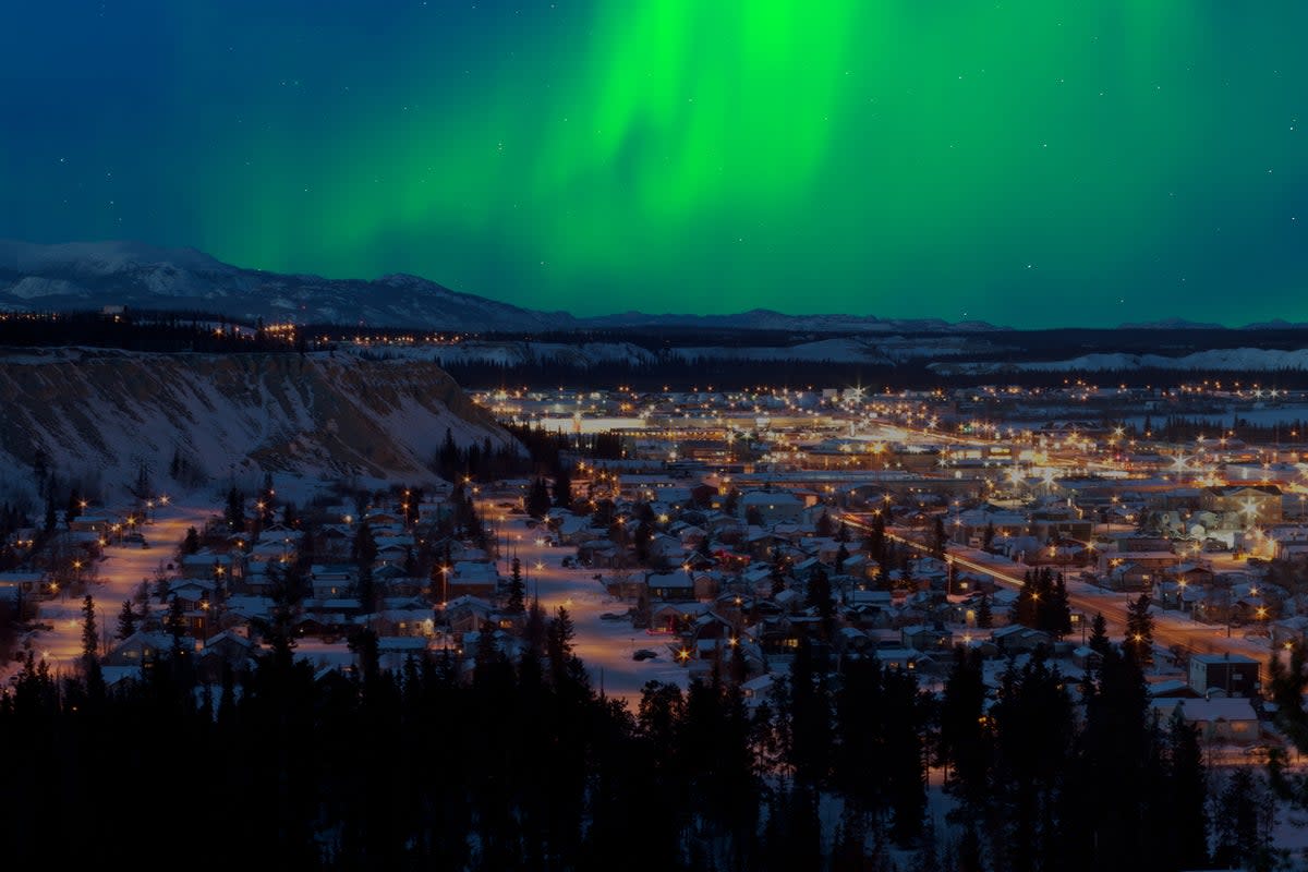 A view of the aurora borealis over downtown Whitehorse (Getty Images/iStockphoto)