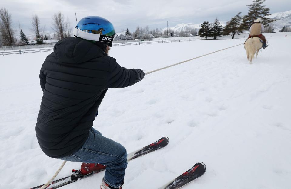 Trevor Howard, on horseback, and skier Scott Hoover practice for an upcoming skijoring competition in Heber City on Tuesday, Feb. 6, 2024. | Jeffrey D. Allred, Deseret News