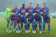FC Barcelona pose for ateam photo ahead of friendly soccer match against the A-League All Stars' at Stadium Australia in Sydney, Australia, Wednesday, May 25, 2022. (AP Photo/Rick Rycroft)