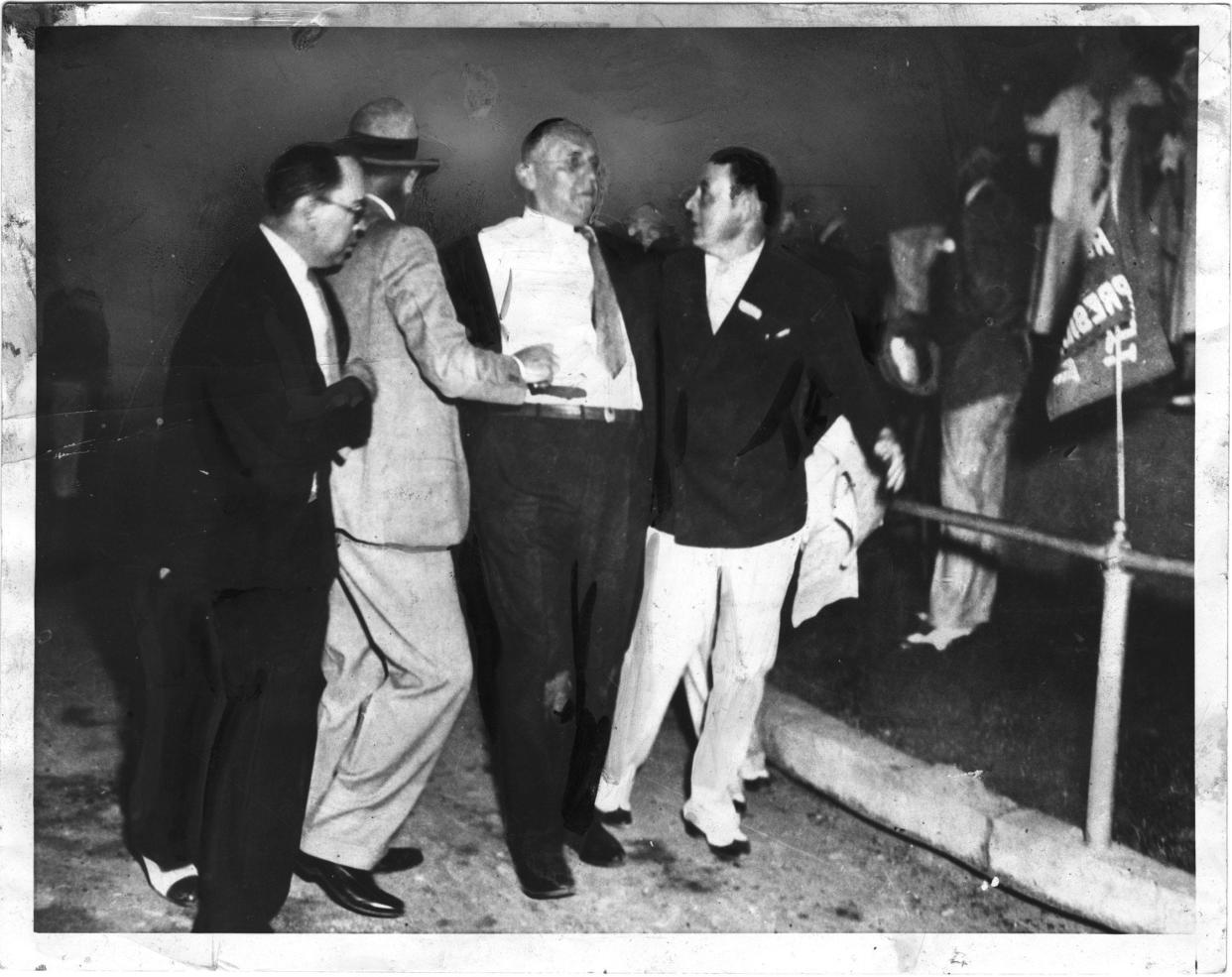 Chicago Mayor Anton Cermak is held moments after being shot during an assassination attempt on President-elect Franklin Roosevelt on Feb, 15, 1933, in Miami. Cermak died March 6, and his assassin, Giuseppe Zangara, was executed later that month.