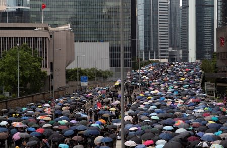 Demonstrators attend a protest in Hong Kong