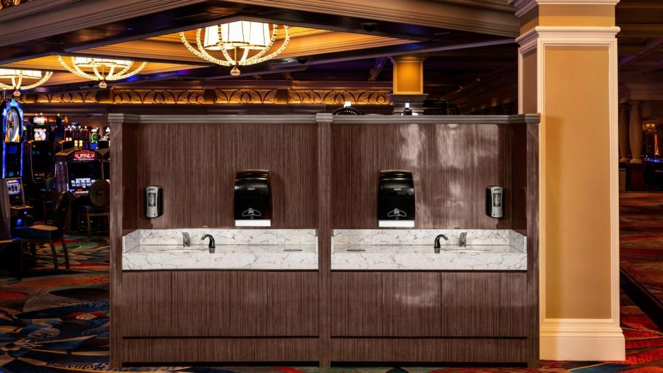 This digital mock-up, provided by MGM Resorts, illustrates what a hand-washing station beside the casino might look like when Bellagio reopens, possibly early next month.