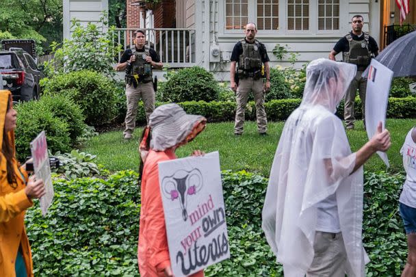 PHOTO: Protesters march past Supreme Court Justice Brett Kavanaugh's home on June 8, 2022 in Chevy Chase, Md. (Nathan Howard/Getty Images)