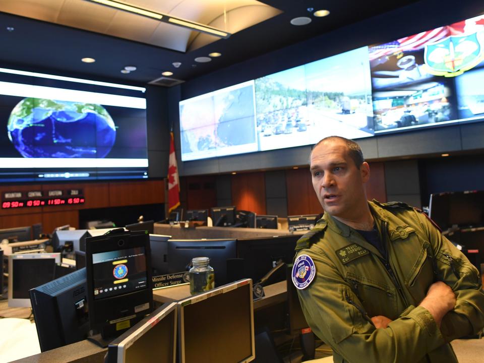 Royal Canadian Air Force Colonel Travis Morehen, NORAD and USNORTHCOM Command Center Director, stands inside the command center inside Cheyenne Mountain Air Force Station on May 10, 2018 in Colorado Springs, Colorado.