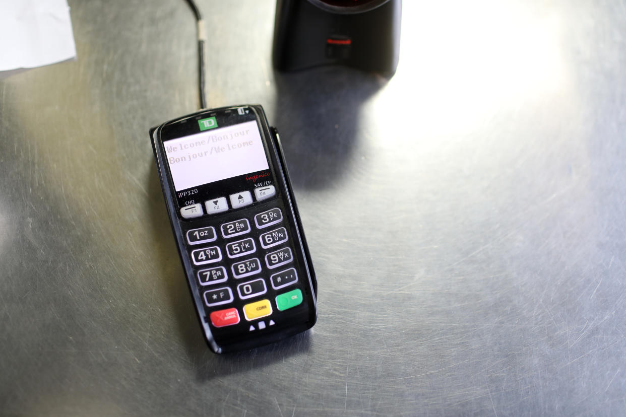 Point of Sale or debit/ credit machine. (Rene Johnston/Toronto Star via Getty Images)