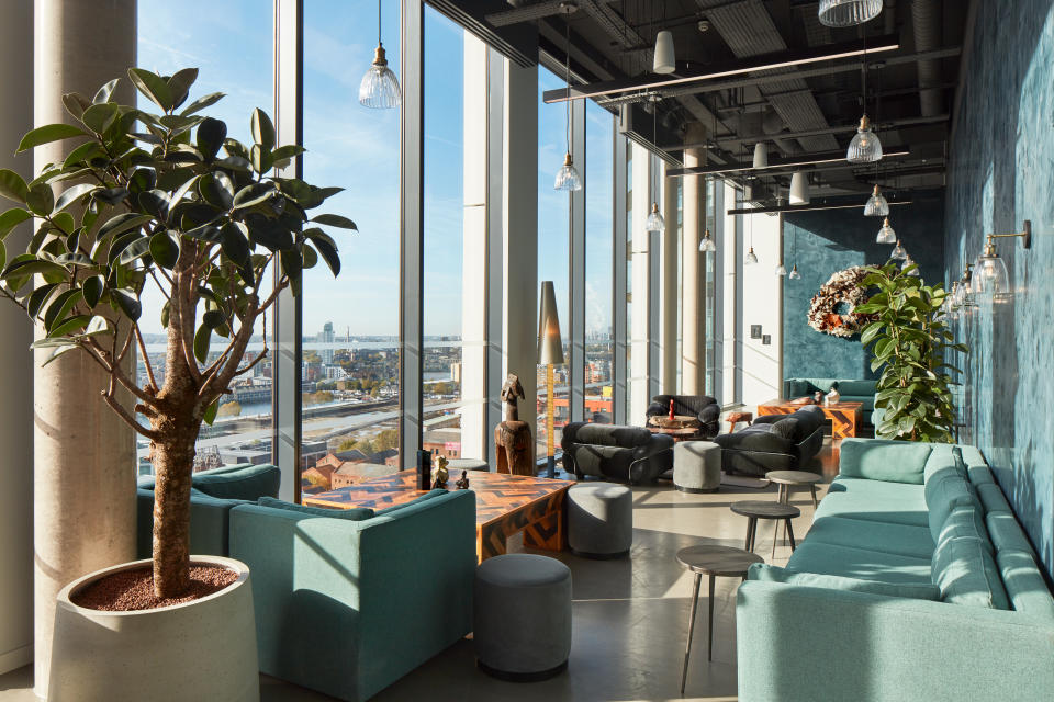 The lounge of Mthr, The Collective Canary Wharf's bar and restaurant, is featured in this photo.