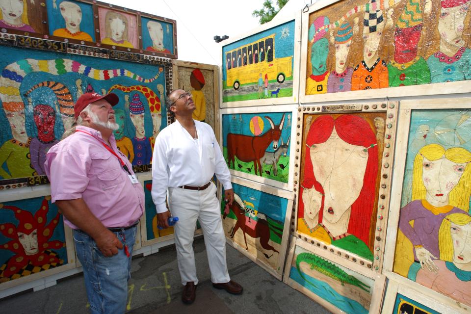 Former Columbus Mayor Michael B. Coleman talks with an artist at the 2009 festival.