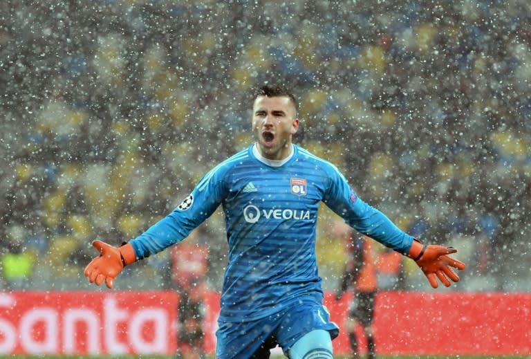 Lyon goalkeeper Anthony Lopes celebrates his side qualifying for the Champions League last 16 with a 1-1 draw against Shakhtar Donetsk in Kiev