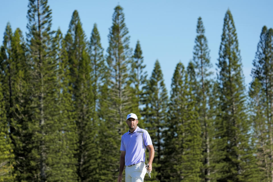 Scottie Scheffler watches his shot on the second green during the final round of The Sentry golf event, Sunday, Jan. 7, 2024, at Kapalua Plantation Course in Kapalua, Hawaii. (AP Photo/Matt York)