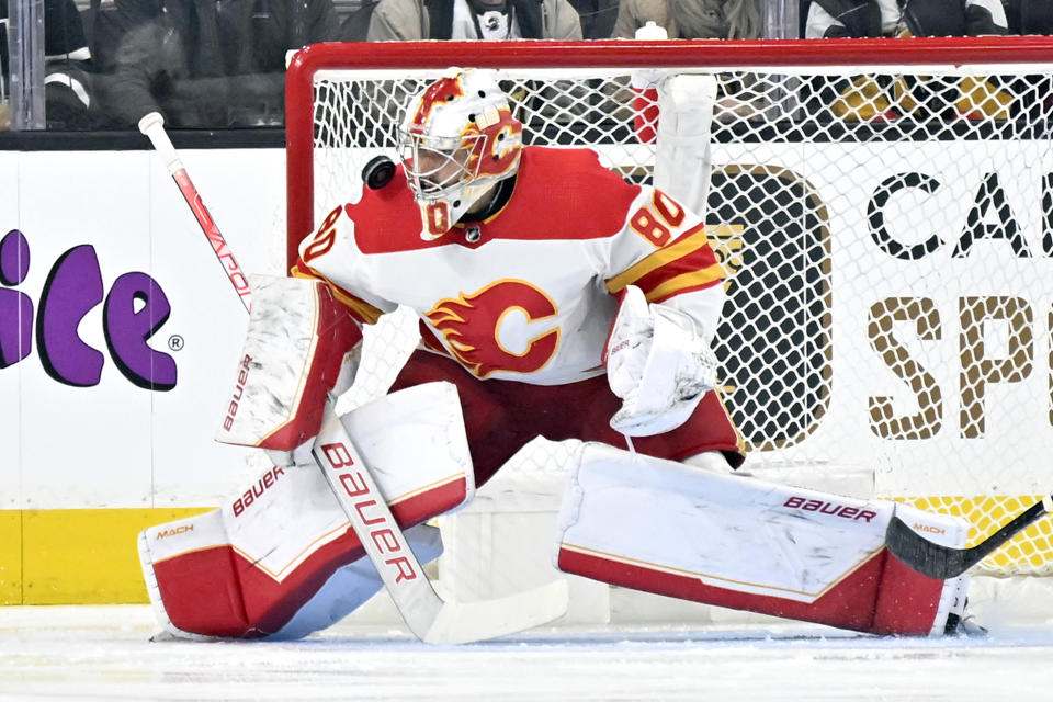 Calgary Flames goaltender Dan Vladar defends the net against the Vegas Golden Knights during the first period of an NHL hockey game Thursday, Feb. 23, 2023, in Las Vegas. (AP Photo/David Becker)