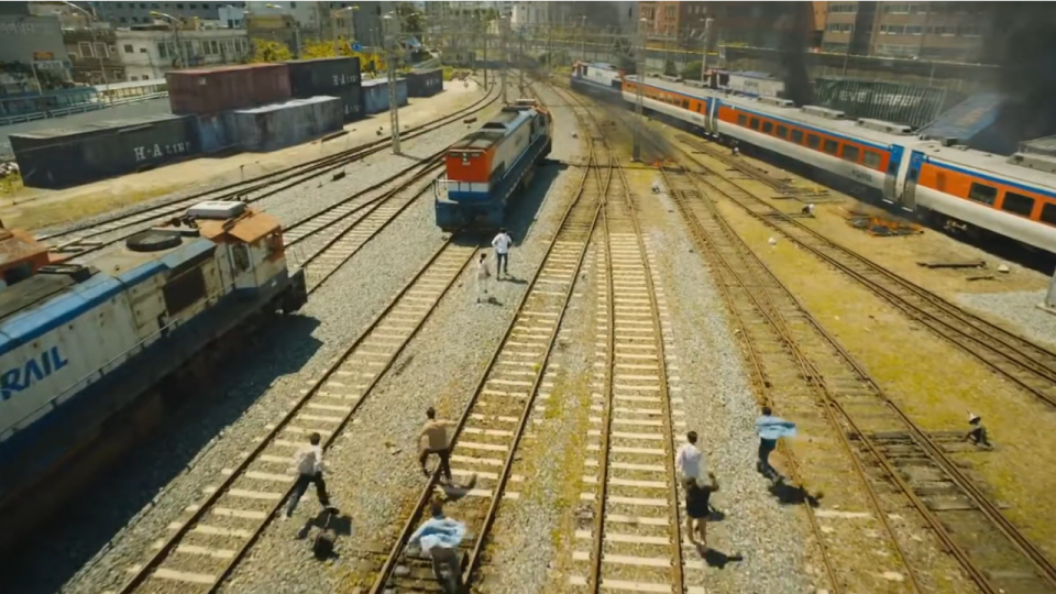The zombies chasing the protagonist in Train to Busan.