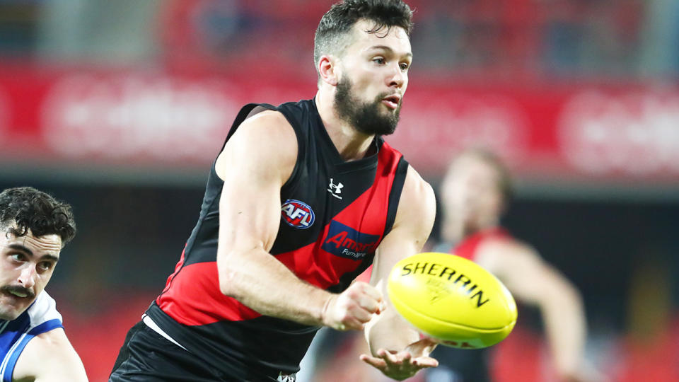 Conor McKenna, pictured here in action for Essendon against North Melbourne in the AFL.