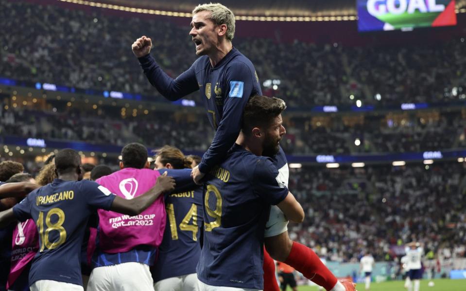 Antoine Griezmann and Olivier Giroud of France celebrate after the FIFA World Cup Qatar 2022 quarter final match between England and France at Al Bayt Stadium - Getty Images