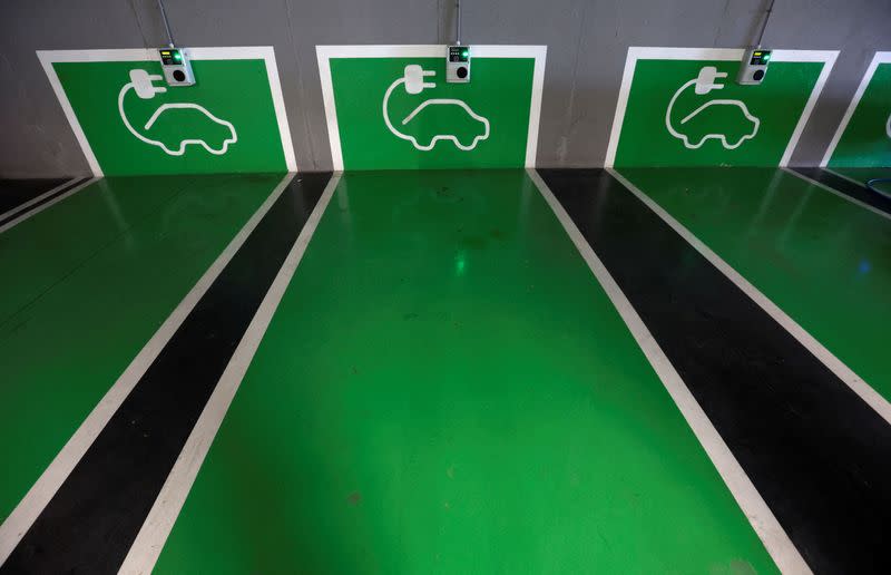 FILE PHOTO: Electric vehicle Circutor chargers are pictured in a supermarket's parking lot