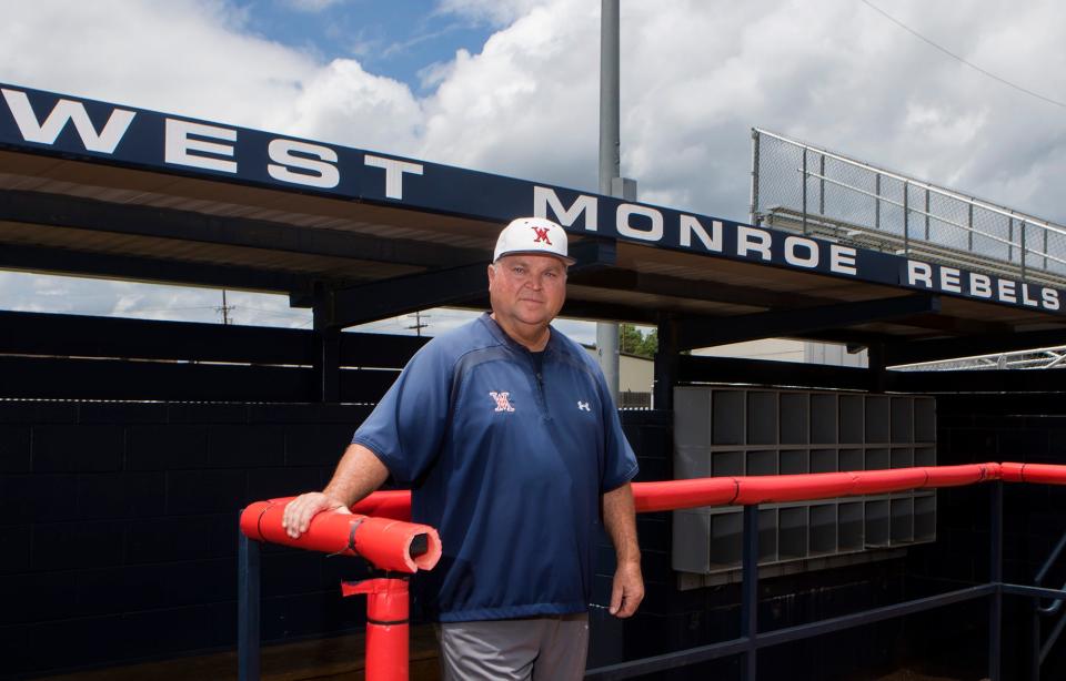 West Monroe's head coach Wade Simoneaux poses for a portrait in front of the school's dugout in West Monroe, La. on June 6. Simoneaux was named the All NELA Baseball Coach of The Year. "I'm surprised," Simoneaux said. "My vote would've gone to one of the coaches that won state around here."