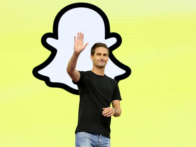 <p>Joe Scarnici/Getty</p> Evan Spiegel onstage at the Snap Partner Summit 2023 in Santa Monica, California.