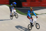 LONDON, ENGLAND - AUGUST 09: Arnaud Dubois of Belgium (R) pumps through a section during the Men's BMX Cycling Quarter Finals on Day 13 of the London 2012 Olympic Games at BMX Track on August 9, 2012 in London, England. (Photo by Phil Walter/Getty Images)