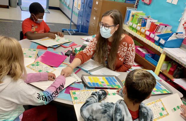 Sierra Nobbs, an intervention teacher at Grace Miller Elementary in the Bonita Unified School District, works with a small group of fourth-graders. (Bonita Unified School District)