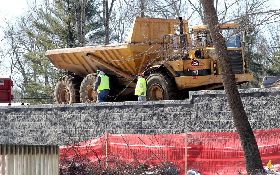 A wall separates a home's backyard from a cemetery being built on Hillside Ave. in Airmont Feb. 15, 2022.